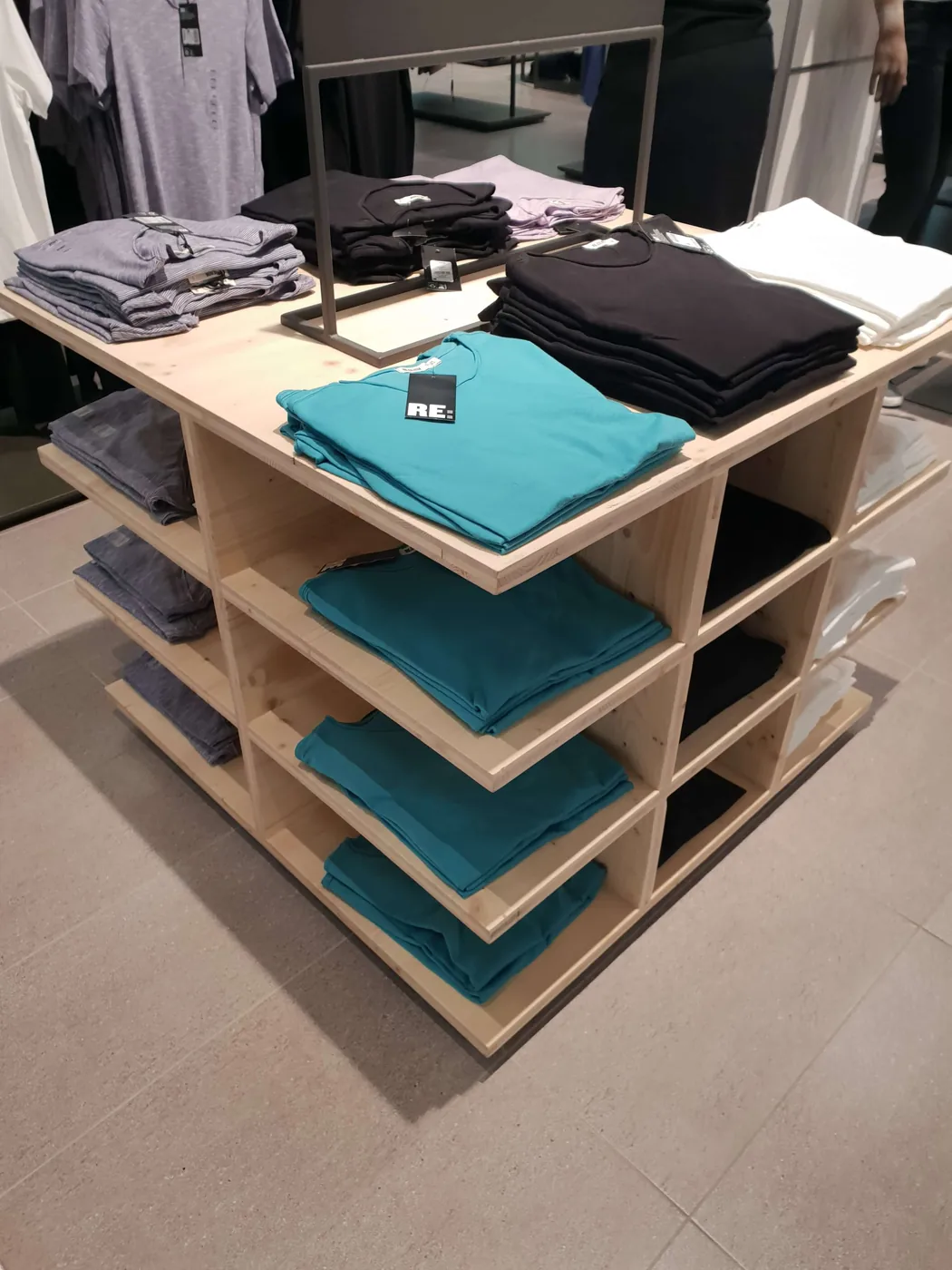 Custom built tiered product display stand