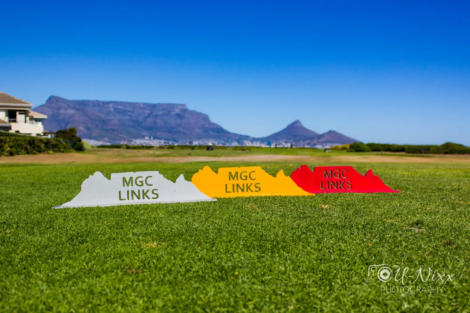 MGC Links custom colourful signs on a golf course